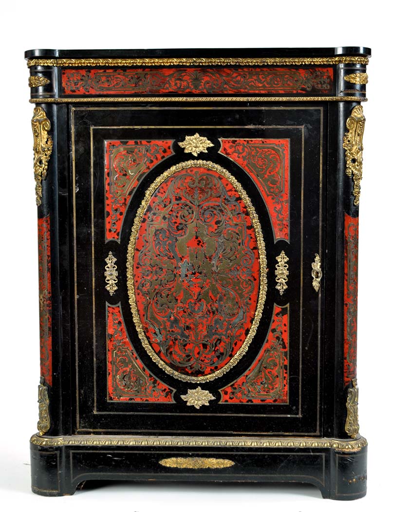 A 19th Century French cabinet, with ebonised top above the frieze, door and rounded corners