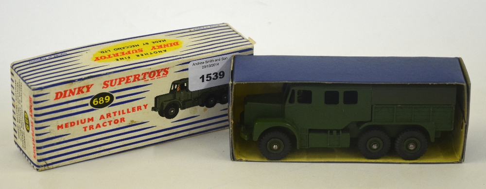 Dinky Supertoys no. 689 medium Artillery Tractor and seated driver figure, original blue striped box