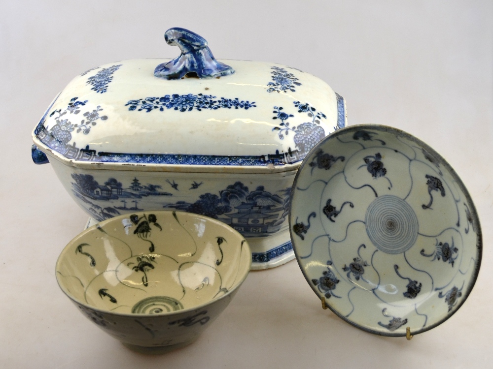 An 18th century Chinese blue and white tureen decorated with a watery landscape and two rabbit