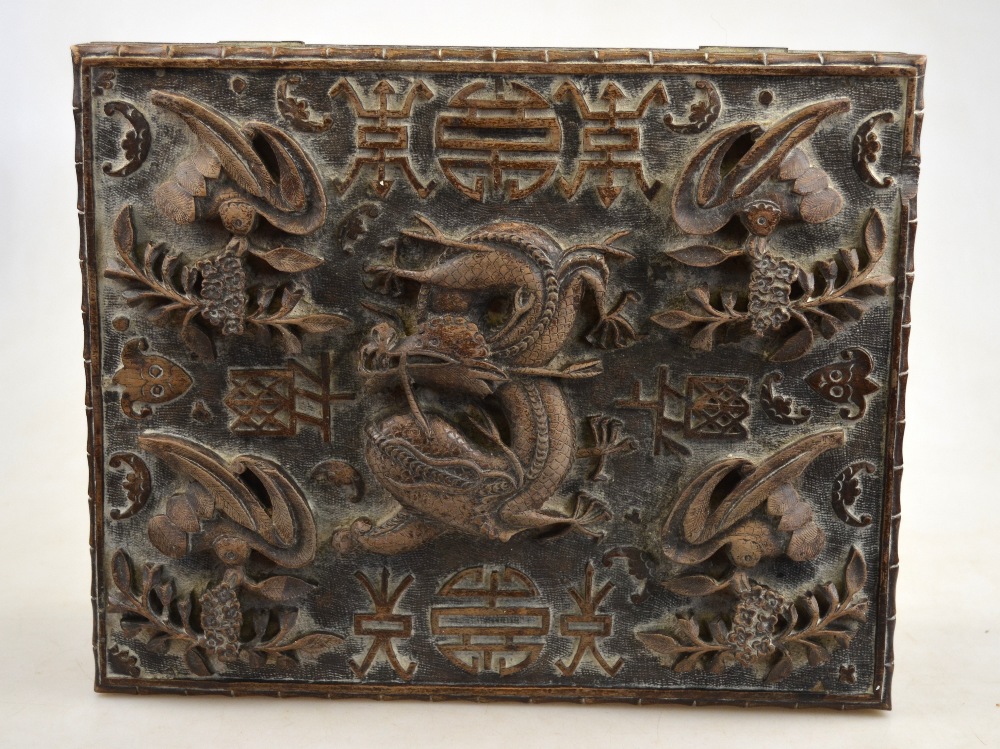 A Chinese hardwood box carved with birds surrounding a writhing dragon on a shou carved ground, 19th - Image 2 of 3