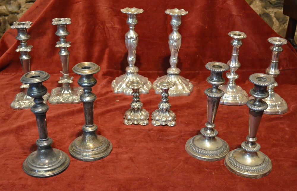 Six various pairs of electroplated and other candlesticks (box)