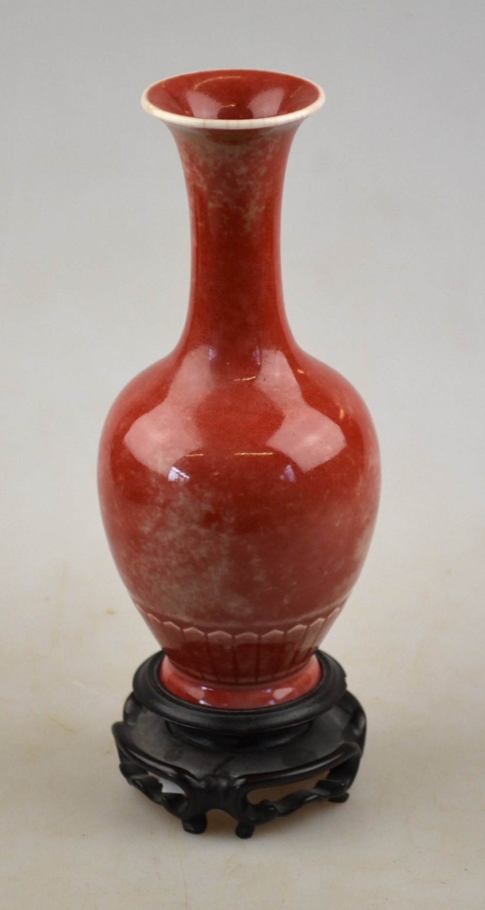 A Chinese peach bloom ovoid vase with long flared neck, Kangxi six character mark but later, 16