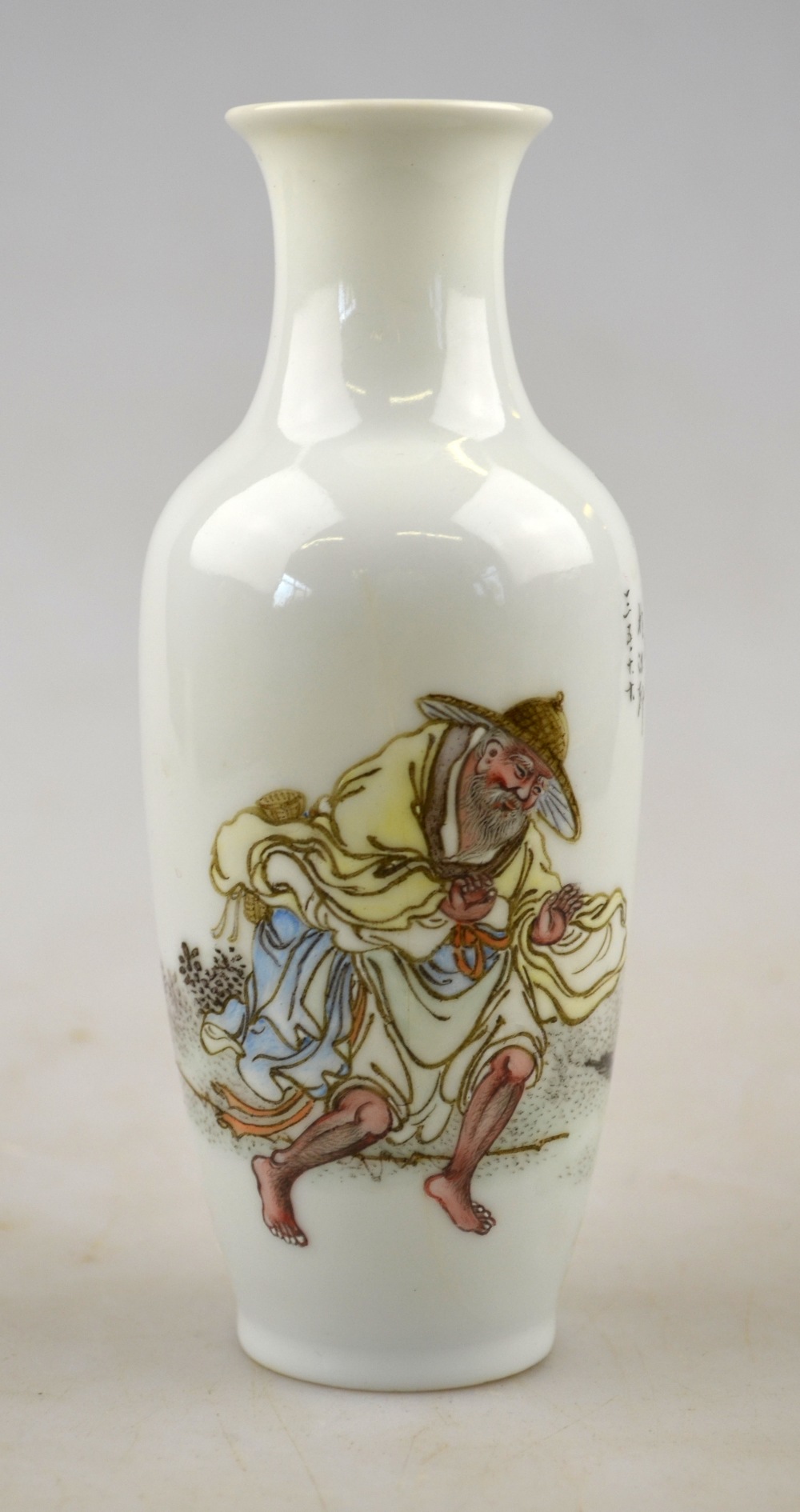 A small Chinese famille rose baluster vase decorated with an old man, bird and calligraphy, six