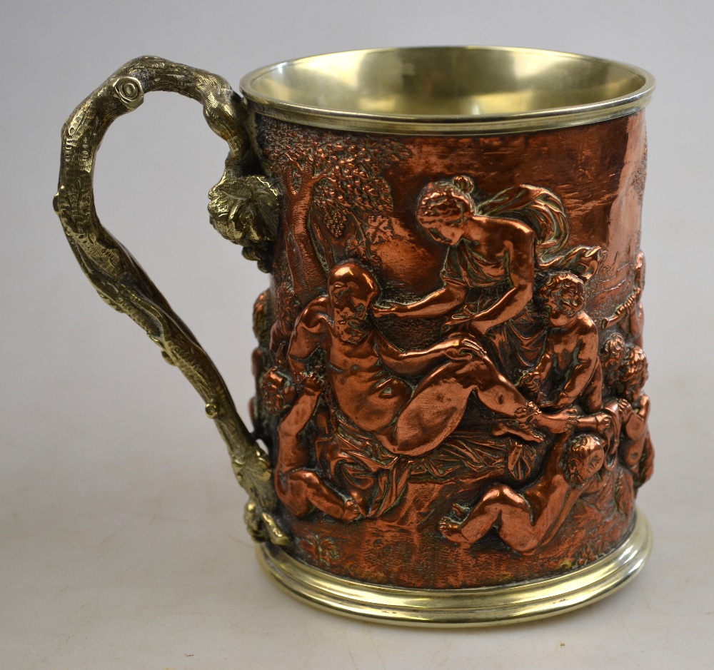 A 19th century electroplated mug with relief copper frieze depicting Bacchanalian scene