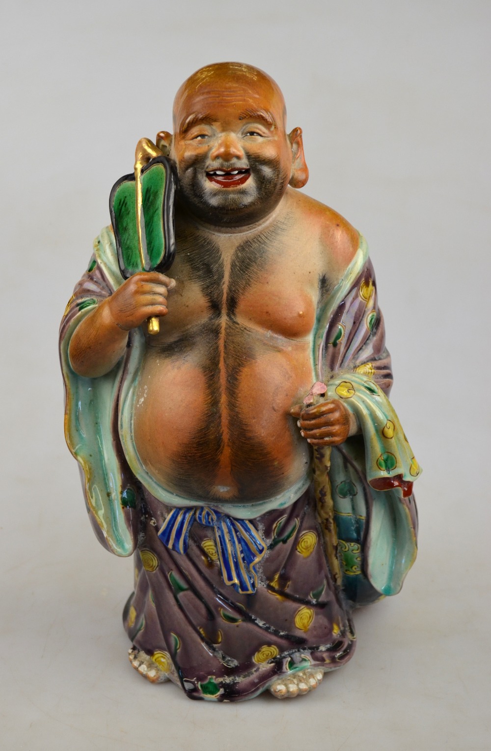 A Chinese polychrome standing figure of Budai, 20th century, 33 cm   Condition Report  a/f