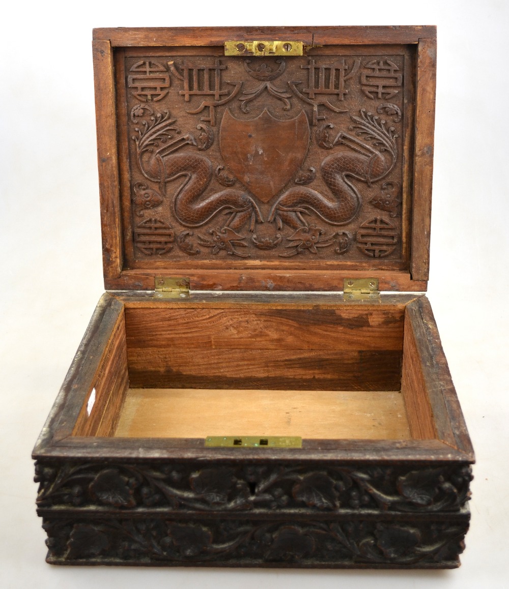 A Chinese hardwood box carved with birds surrounding a writhing dragon on a shou carved ground, 19th - Image 3 of 3