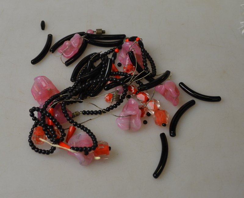 An Art Deco black and orange bead necklace to/w glass bead necklace in need of restringing