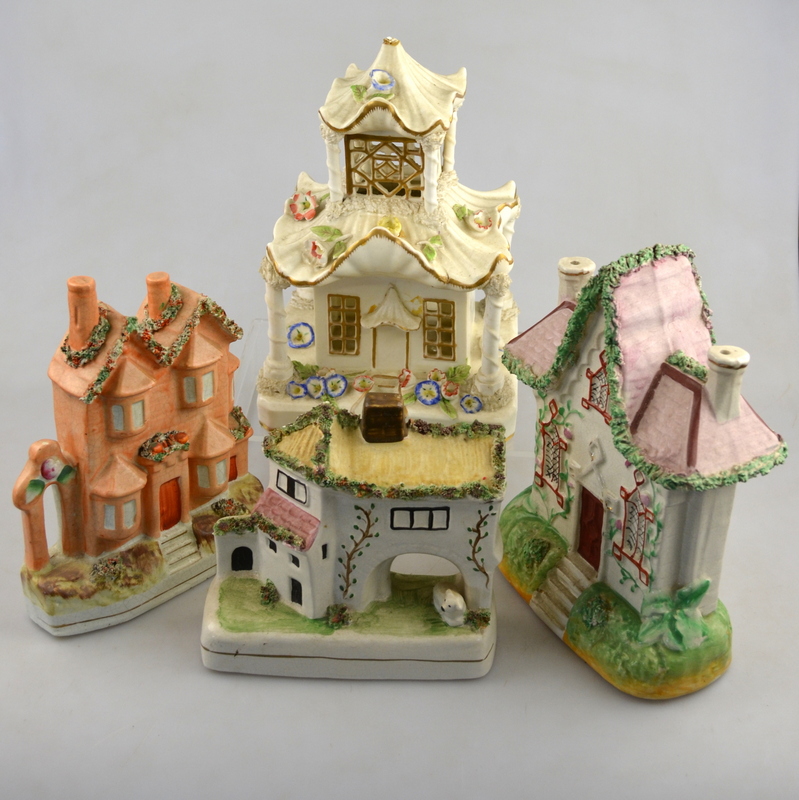 A Victorian Staffordshire pastille burner in the form of a pagoda house, 24 cm to/w three further
