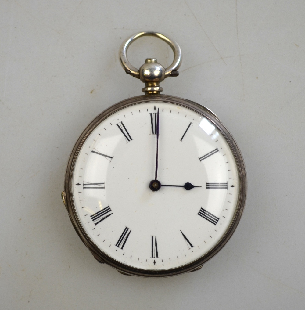 A Continental white metal fob watch with enamel dial and key-wind movement, 4 cm diameter