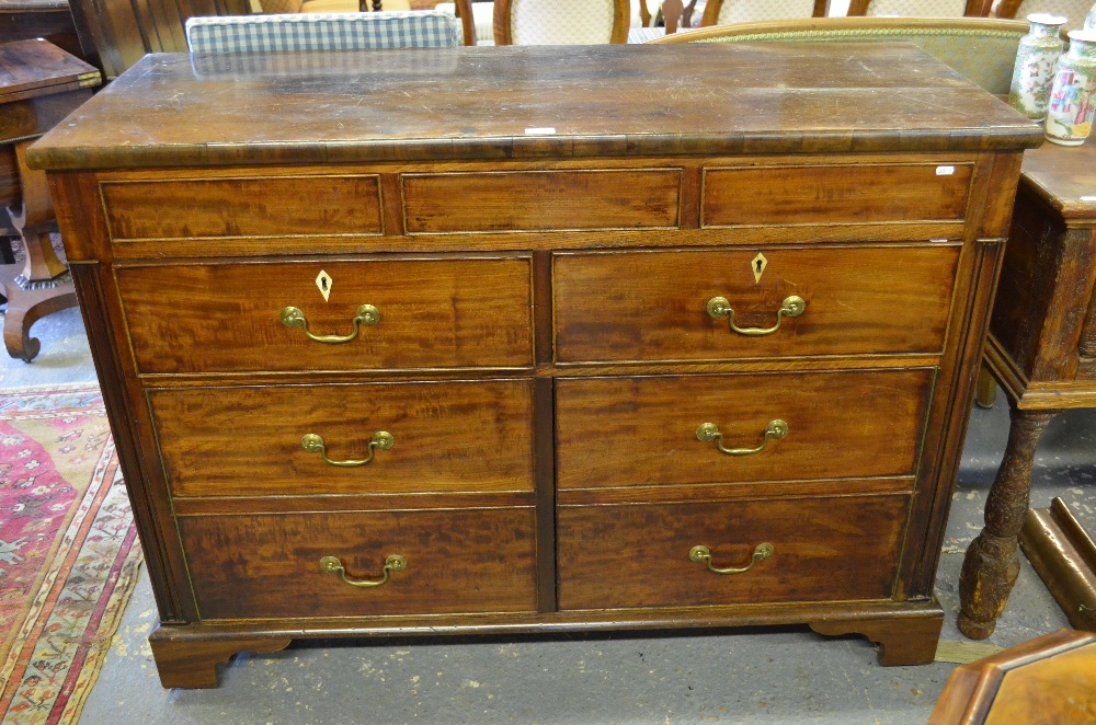 A 19th century and later mahogany and oak sideboard in the style of a mule chest having three