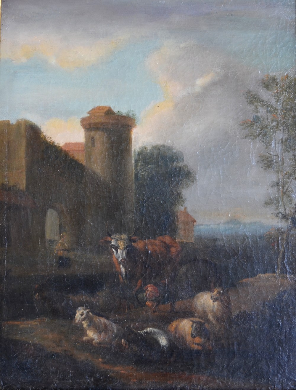 Circle of Nicolaes Berchem - An Italianate landscape with cow, sheep and figure, oil on canvas, 40 x