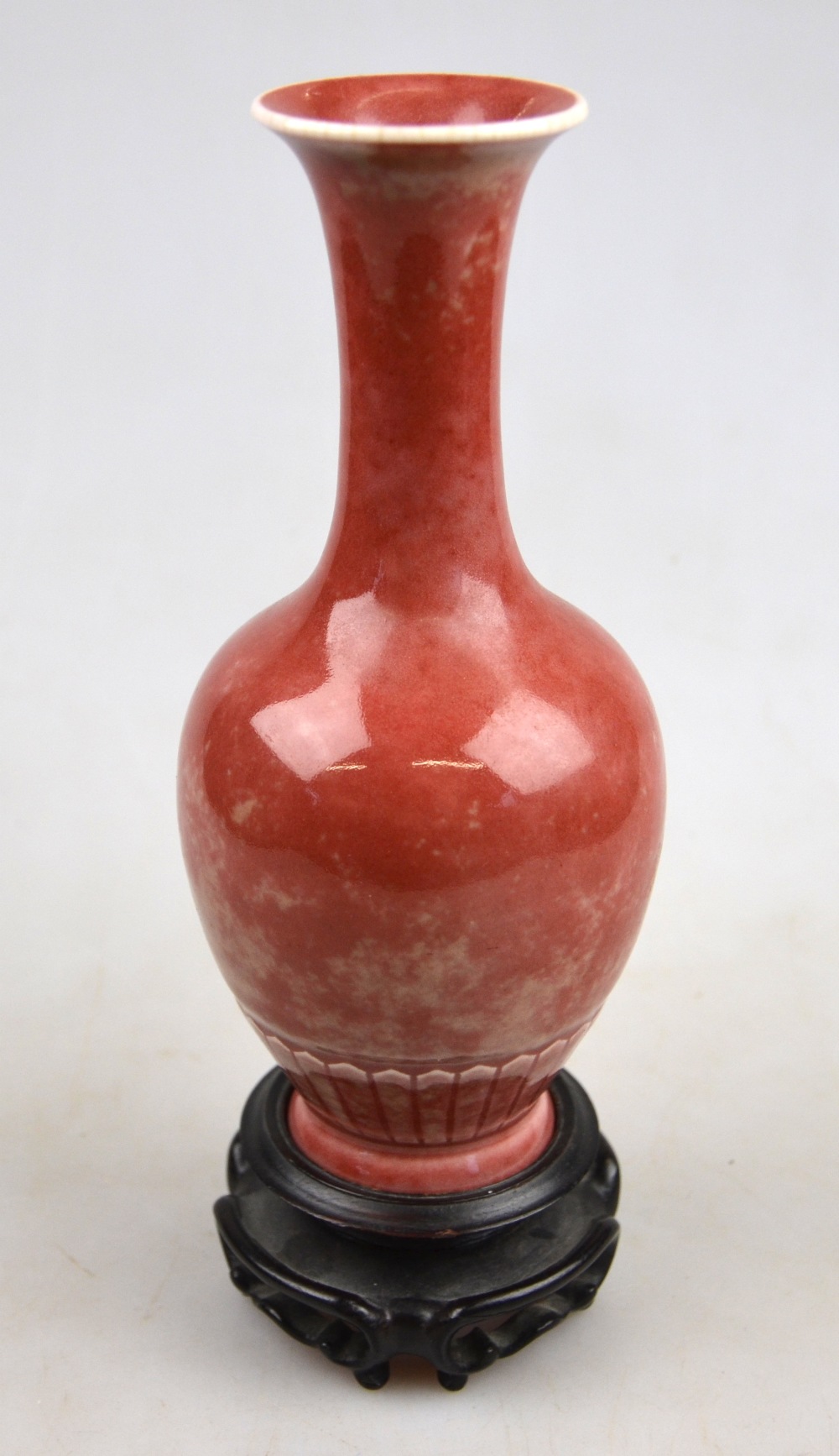 A Chinese peach bloom ovoid vase with long flared neck, Kangxi six character mark but later, 16