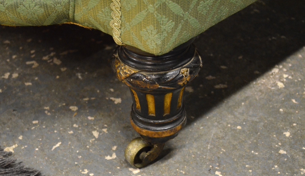 A late 19th century patterned green upholstered sofa, raised on short turned and reeded front legs - Image 2 of 2