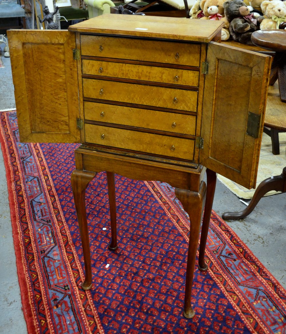 A 19th century crossbanded pollard oak table cabinet, the pair of doors enclosing five graduated - Image 2 of 2