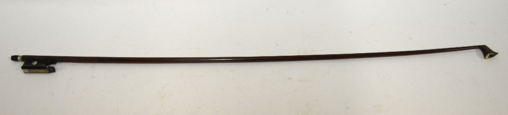 A violin bow by Nach Vuillaume (Paris)   Condition Report  Losses to end-cap of screw and head-cap