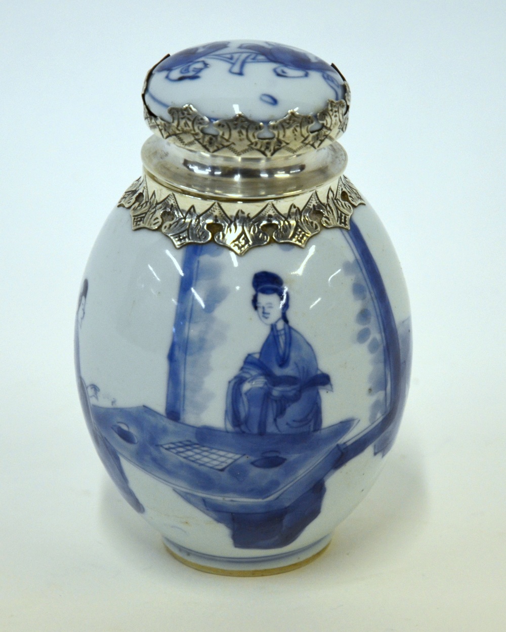 A Chinese blue and white small ovoid tea caddy and cover, Kangxi (1662-1722), the body decorated