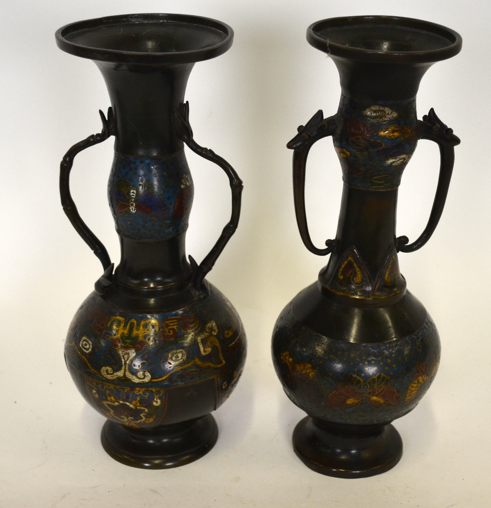 Two Chinese champleve vases, one decorated with butterflies around the neck and Taotie masks to