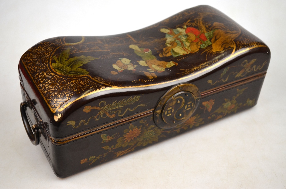 A Chinese 20th century black lacquer jewellery box, the pillow shaped hinged cover decorated with