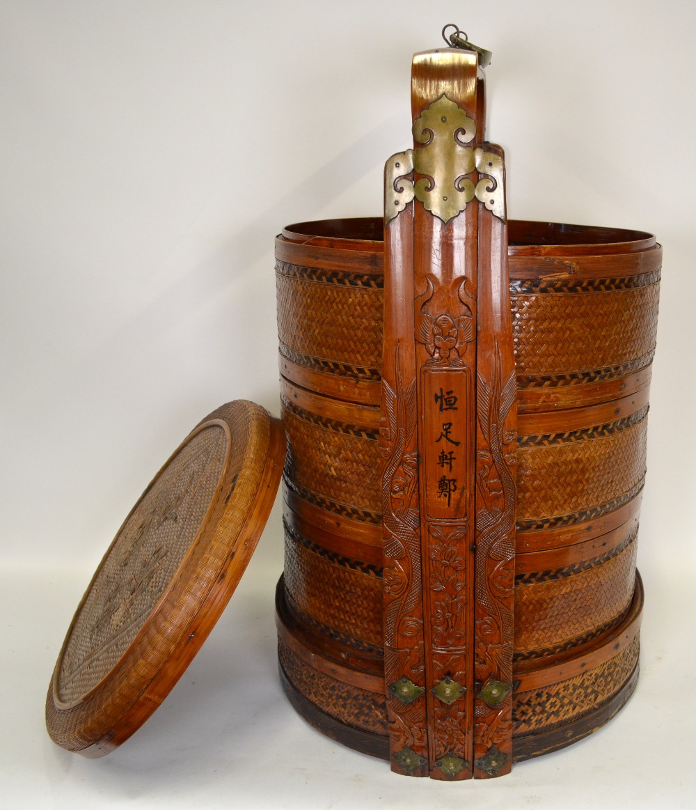 A Chinese wedding basket, split cane and bamboo, having four sections and a carved handle, 75 cm h. - Image 2 of 2