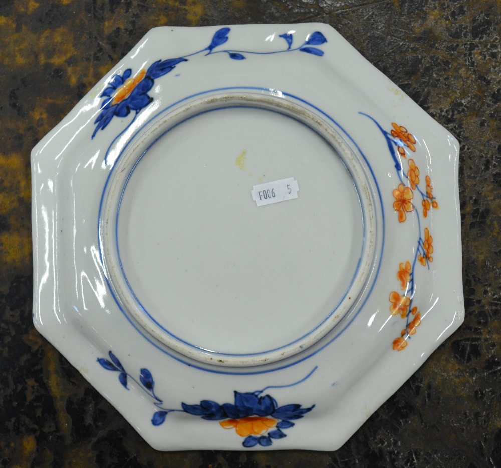 A Japanese 19th century octagonal Imari plate, 25 cm dia.   Condition Report  Chip on rim - Image 2 of 2