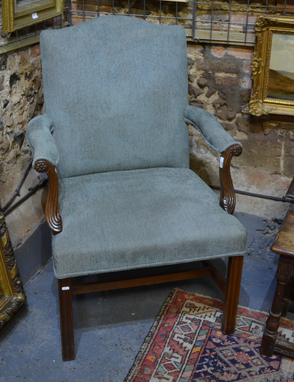 A pair of Gainsborough styled pale green upholstered mahogany framed open armchairs (2)