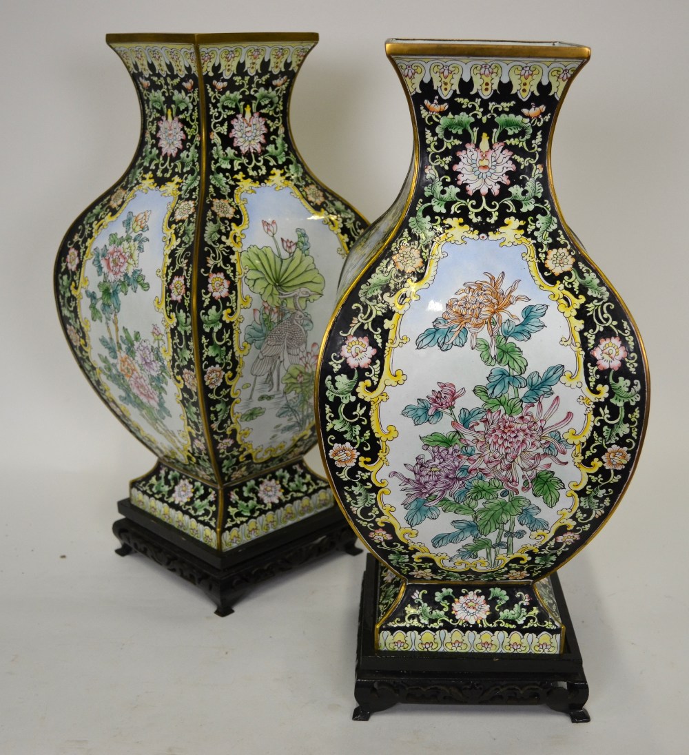 A large pair of Chinese Canton enamel vases of square form, each face decorated with flowers,