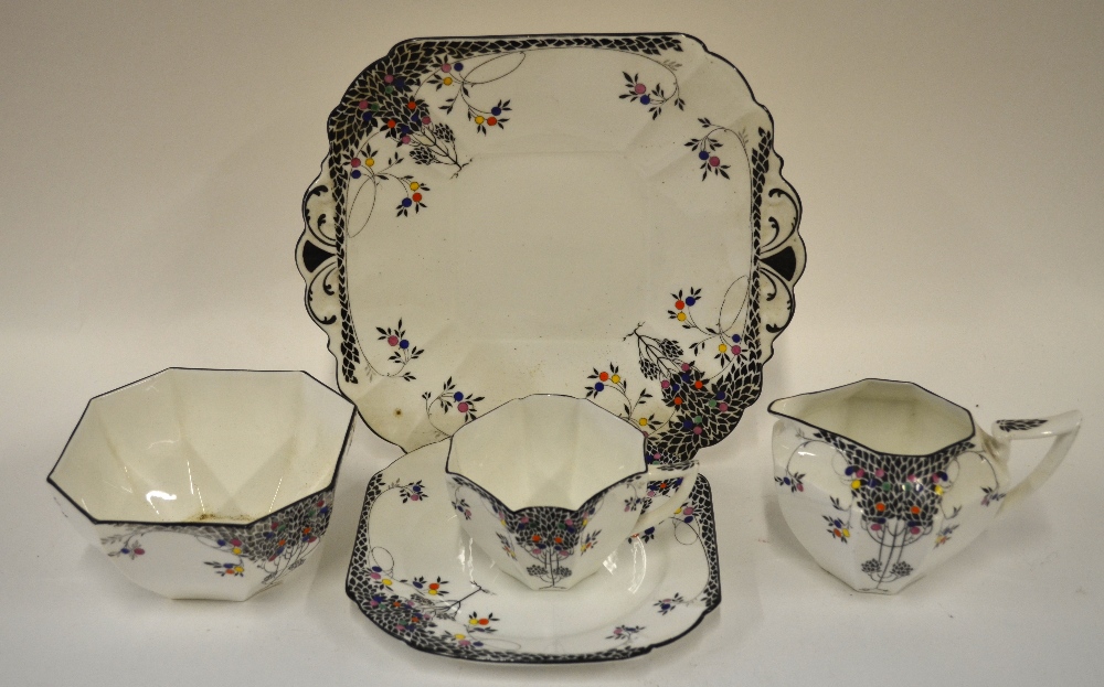 A Shelley Art Deco tea service, Queen Anne shape, pattern no. 11575, decorated with black trees