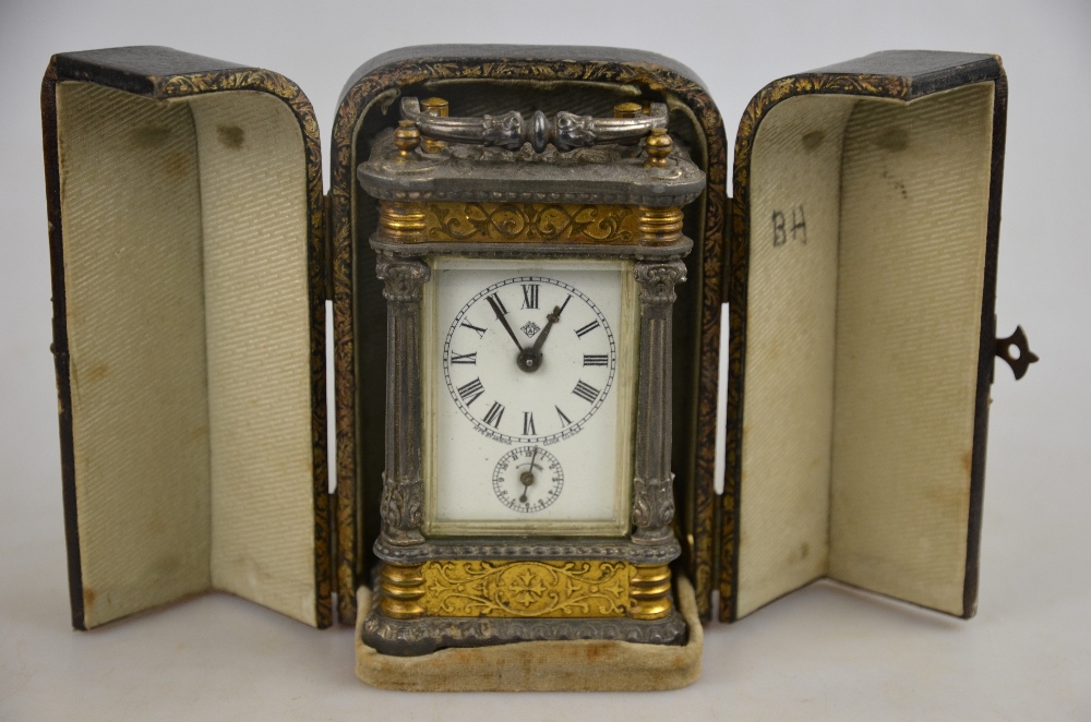 A 19th century American Ansonia Clock Co. parcel gilt spelter carriage clock with enamelled dial, 14