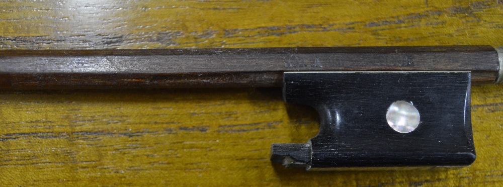 A violin bow by Nach Vuillaume (Paris)   Condition Report  Losses to end-cap of screw and head-cap - Image 4 of 5