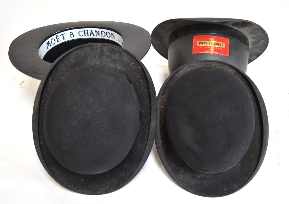 Dunn & Co., Ltd. bowler hat size 7, another bowler hat, a hard plastic Moet & Chandon 'top hat'