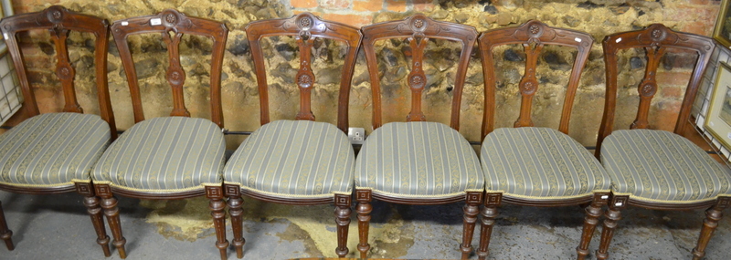 A set of six Victorian Aesthetic period walnut framed side chairs with overstuffed seats (6)