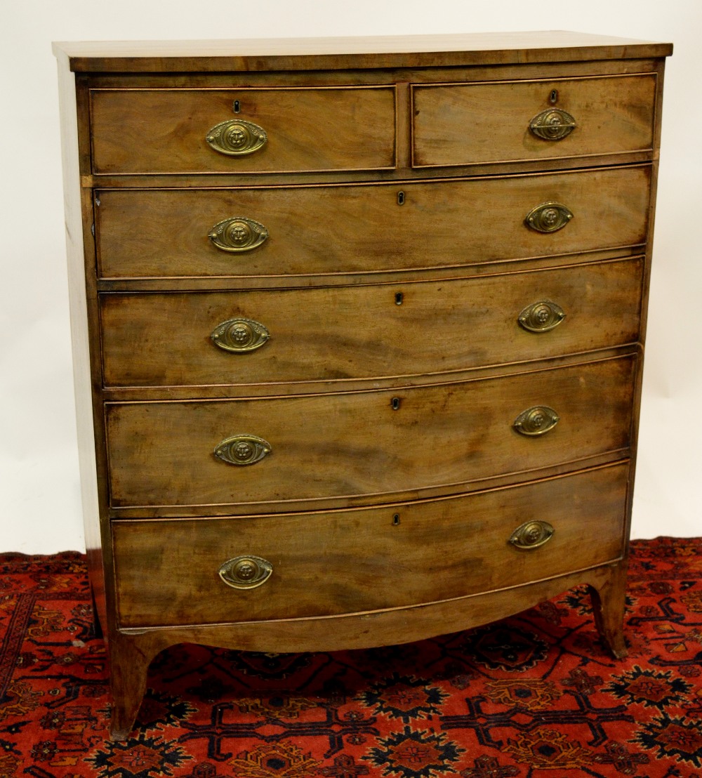 Victorian mahogany bow front chest of two short over four long graduated cockbeaded drawers raised