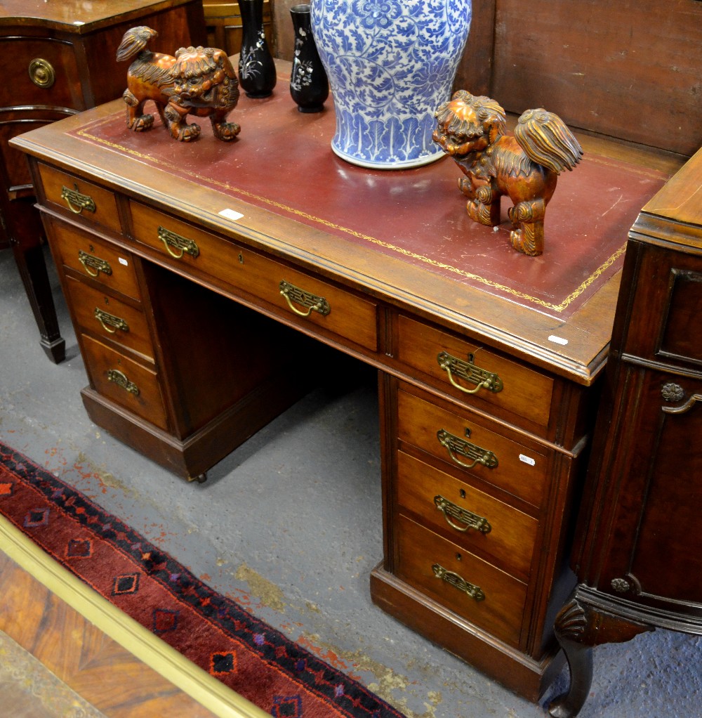 Victorian mahogany pedestal desk, the top with inset red leather surface over an arrangement of