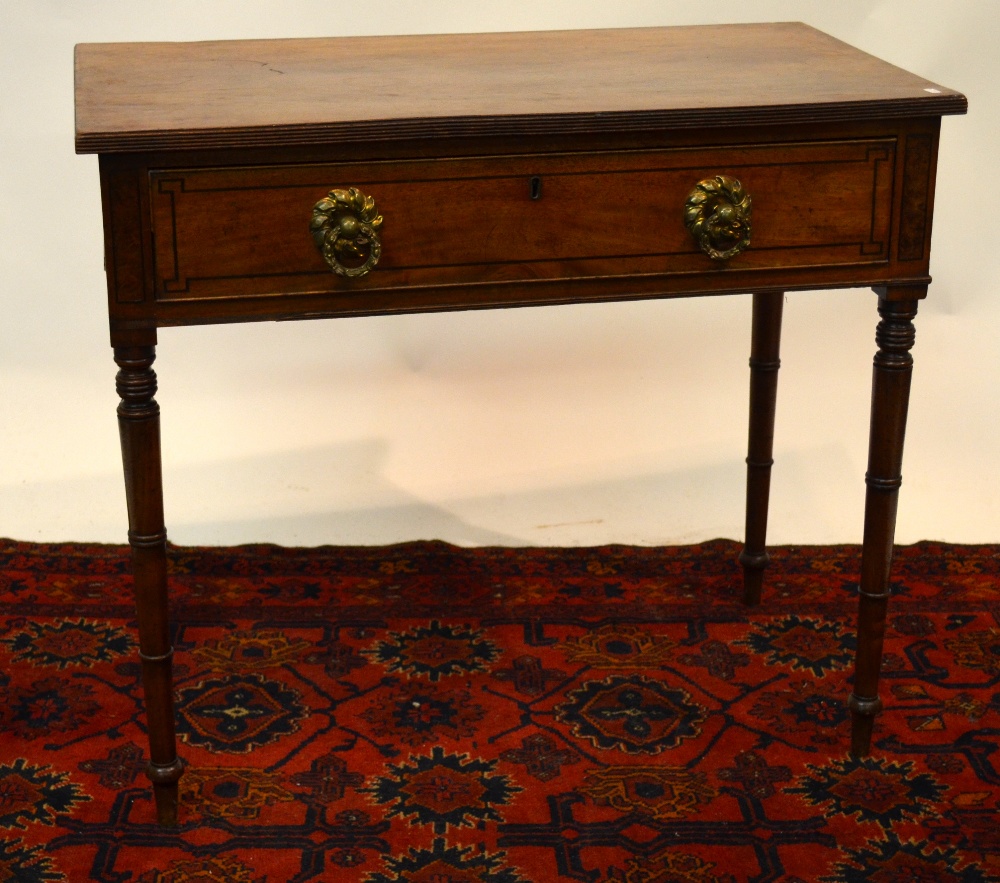 A 19th century mahogany side table, with single deep frieze drawer, raised on slender turned legs,
