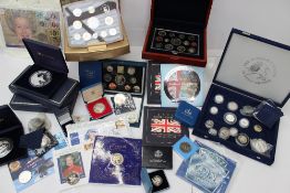 A 2003 United Kingdom executive proof coin set, together with other proof coin sets, cubic zirconium