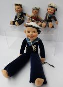 A Norah Wellings large sailor doll with Empress of Australia hat band, together with two smaller