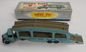 A Dinky Toy No.582 Pullmore car transporter, together with Tri-ang trains, car advertising brochures