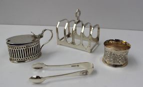 A George VI silver four division toast rack, Sheffield, 1947, together with an Edward VII silver
