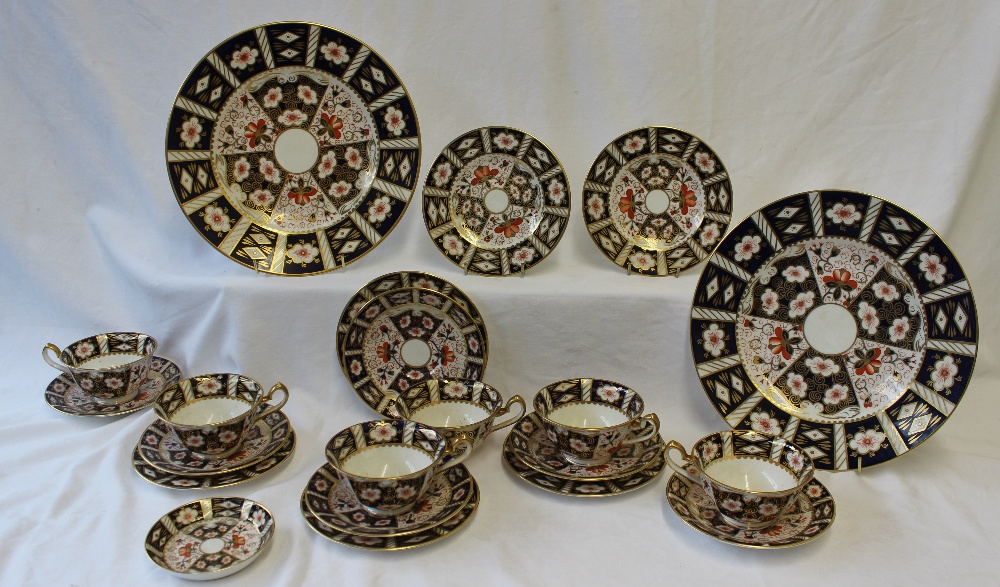 A Royal Crown Derby porcelain part tea set 2451 pattern comprising two plates 26.5cm diameter, six