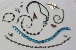 A white metal and turquoise panel set necklace together with turquoise earrings, a silver and