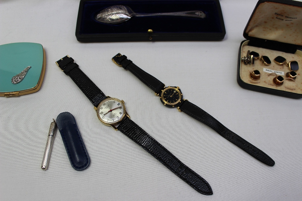 A lady`s Bueche-Girod wristwatch together with an Oriosa wristwatch, compact, silver toothpick and