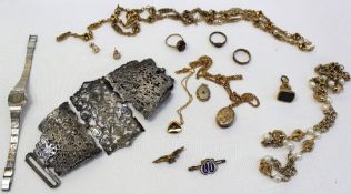 Assorted costume jewellery including an electroplated nurses belt, yellow metal bracelet, a Solvil
