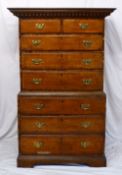 A 19th century oak and mahogany crossbanded chest on chest, the moulded dentil cornice above two