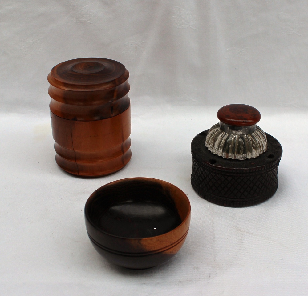 A 19th century treen and glass desk inkwell together with a turned treen box and bowl