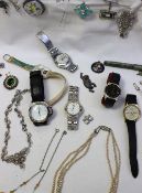 Assorted costume jewellery including a Pierre Cardin gentleman`s wristwatch, other wristwatches,