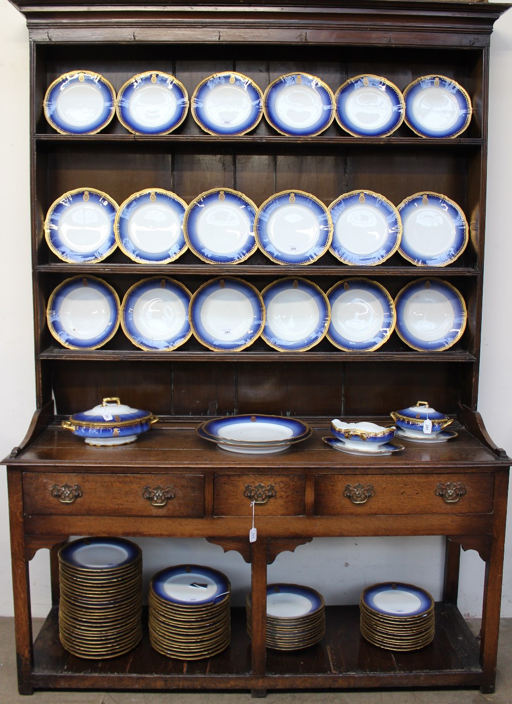 An extensive French porcelain dinner set comprising a large meat plate 52cm long another meat