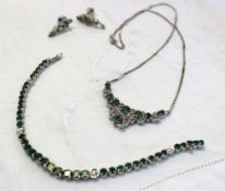 A Suite of emerald and diamond jewellery, including a necklace, a tennis bracelet and a pair of drop