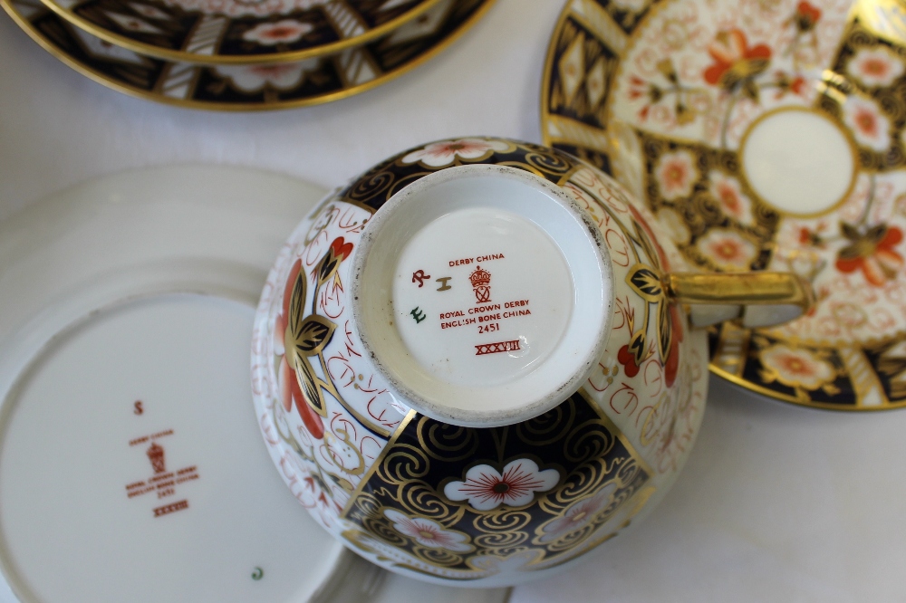 A Royal Crown Derby porcelain part tea set 2451 pattern comprising two plates 26.5cm diameter, six - Image 2 of 2