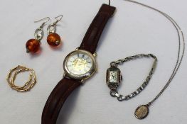 A collection of costume jewellery including a Titus Lady`s wristwatch, a gentleman`s watch, earrings