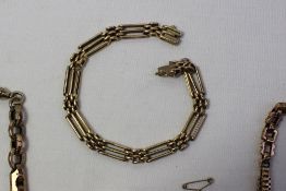 A 9ct yellow gold bracelet together with two yellow metal Albert chains, a 9ct yellow gold bar